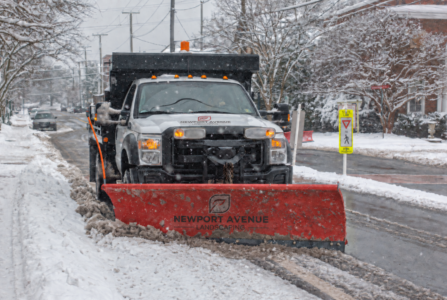 Newport Avenue Landscaping snow plow truck ready for winter service